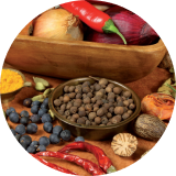 A close up of natural fruit and vegetable ingredients laid out on a table 