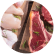 Raw steack and raw chicken on a wood board