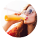 women drinking orange juice