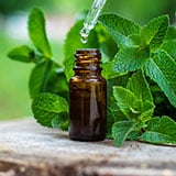A dropper and bottle of essential oil