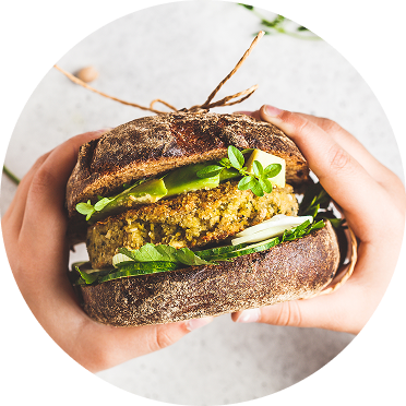 A close up of a veggie burger