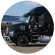 ADM truck with liquid tanks in the background